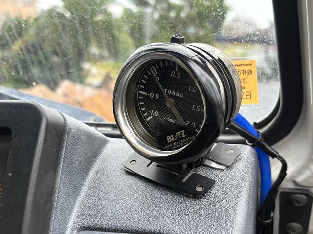 ジムニー CC AC PS 5MT 純正色 社外リーフリフトアップ JA22電動パワステ装着 BRIDEシートフルバケ 外ホイールMTタイヤ 外幌 1型グリル サイドシルガード 外追加メーター MOMOハン ウィンチ(47枚目)