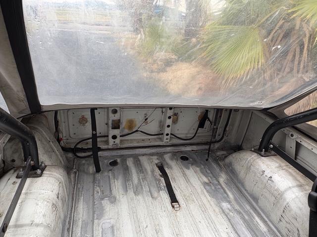 ジムニー CC AC PS 5MT 純正色 社外リーフリフトアップ JA22電動パワステ装着 BRIDEシートフルバケ 外ホイールMTタイヤ 外幌 1型グリル サイドシルガード 外追加メーター MOMOハン ウィンチ(54枚目)