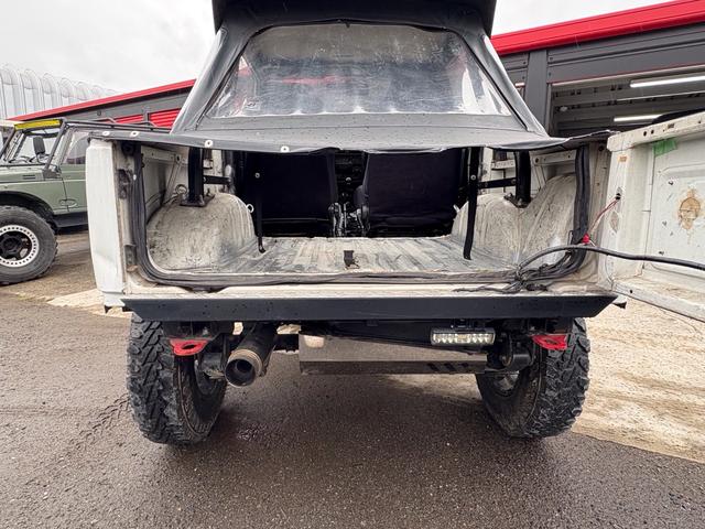 ジムニー CC AC PS 5MT 純正色 社外リーフリフトアップ JA22電動パワステ装着 BRIDEシートフルバケ 外ホイールMTタイヤ 外幌 1型グリル サイドシルガード 外追加メーター MOMOハン ウィンチ(69枚目)