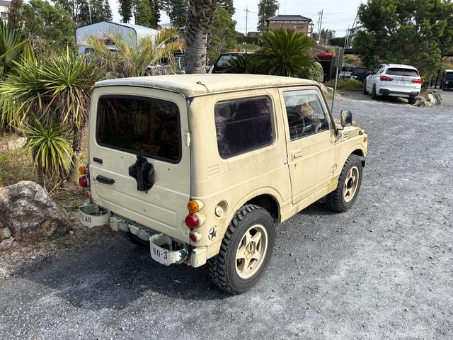 ジムニー スコットリミテッド AC PS 5MT 全塗装 社外フロントバンパー ワンオフ社外テールレンズ ナンバー灯移設 社外AW MTタイヤ 社外シートカバー 社外ハンドル 社外3連追加メーター オーディオレス(12枚目)