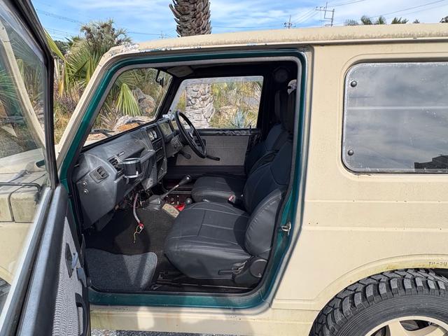 ジムニー スコットリミテッド AC PS 5MT 全塗装 社外フロントバンパー ワンオフ社外テールレンズ ナンバー灯移設 社外AW MTタイヤ 社外シートカバー 社外ハンドル 社外3連追加メーター オーディオレス(49枚目)