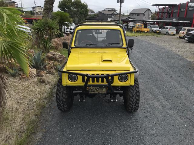 ジムニー サマーウインド　リミテッド　ＡＣ　ＰＳ　５ＭＴ　社外リーフリフトアップ　改造公認車　バンカット車　前後エアロッカー　ダウンギア　油圧電動Ｗパワステ　強化シャフト　ワンオフロールバー　２５５ＭＴタイヤ　ウィンチ　社外前後バンパー（3枚目）