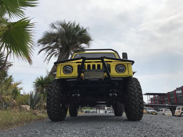 ジムニー サマーウインド　リミテッド　ＡＣ　ＰＳ　５ＭＴ　社外リーフリフトアップ　改造公認車　バンカット車　前後エアロッカー　ダウンギア　油圧電動Ｗパワステ　強化シャフト　ワンオフロールバー　２５５ＭＴタイヤ　ウィンチ　社外前後バンパー（4枚目）