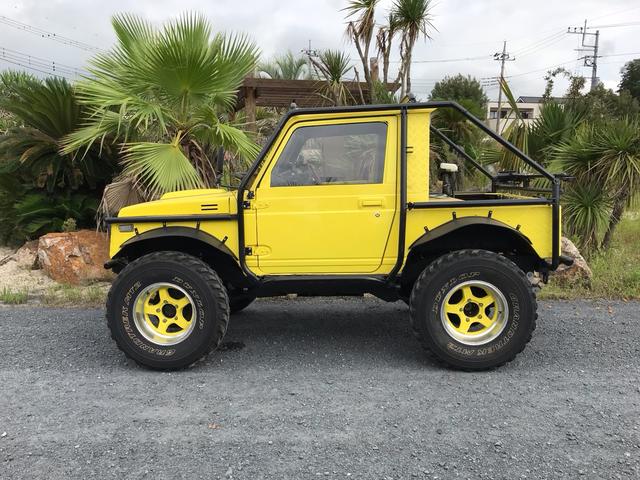 ジムニー サマーウインド　リミテッド　ＡＣ　ＰＳ　５ＭＴ　社外リーフリフトアップ　改造公認車　バンカット車　前後エアロッカー　ダウンギア　油圧電動Ｗパワステ　強化シャフト　ワンオフロールバー　２５５ＭＴタイヤ　ウィンチ　社外前後バンパー（8枚目）