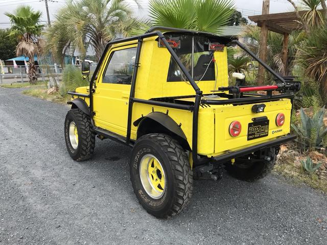 ジムニー サマーウインド　リミテッド　ＡＣ　ＰＳ　５ＭＴ　社外リーフリフトアップ　改造公認車　バンカット車　前後エアロッカー　ダウンギア　油圧電動Ｗパワステ　強化シャフト　ワンオフロールバー　２５５ＭＴタイヤ　ウィンチ　社外前後バンパー（11枚目）