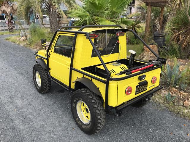 ジムニー サマーウインド　リミテッド　ＡＣ　ＰＳ　５ＭＴ　社外リーフリフトアップ　改造公認車　バンカット車　前後エアロッカー　ダウンギア　油圧電動Ｗパワステ　強化シャフト　ワンオフロールバー　２５５ＭＴタイヤ　ウィンチ　社外前後バンパー（12枚目）