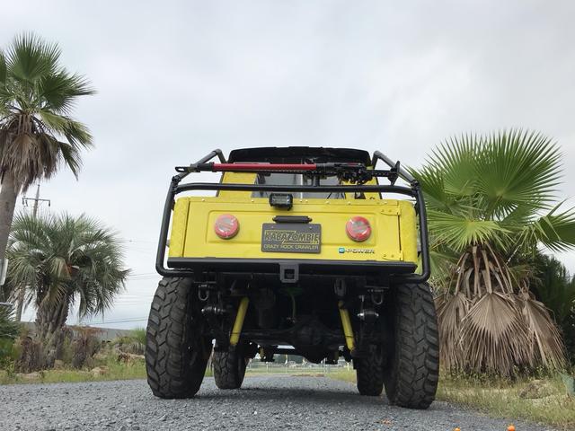 ジムニー サマーウインド　リミテッド　ＡＣ　ＰＳ　５ＭＴ　社外リーフリフトアップ　改造公認車　バンカット車　前後エアロッカー　ダウンギア　油圧電動Ｗパワステ　強化シャフト　ワンオフロールバー　２５５ＭＴタイヤ　ウィンチ　社外前後バンパー（16枚目）