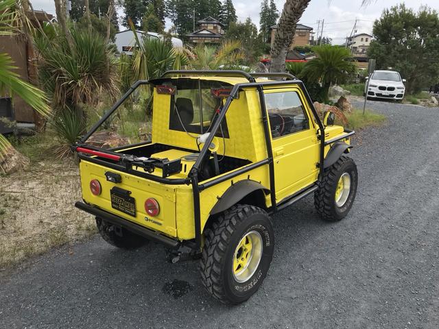 ジムニー サマーウインド　リミテッド　ＡＣ　ＰＳ　５ＭＴ　社外リーフリフトアップ　改造公認車　バンカット車　前後エアロッカー　ダウンギア　油圧電動Ｗパワステ　強化シャフト　ワンオフロールバー　２５５ＭＴタイヤ　ウィンチ　社外前後バンパー（18枚目）