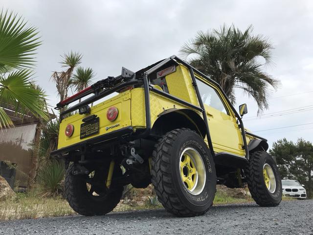 ジムニー サマーウインド　リミテッド　ＡＣ　ＰＳ　５ＭＴ　社外リーフリフトアップ　改造公認車　バンカット車　前後エアロッカー　ダウンギア　油圧電動Ｗパワステ　強化シャフト　ワンオフロールバー　２５５ＭＴタイヤ　ウィンチ　社外前後バンパー（19枚目）