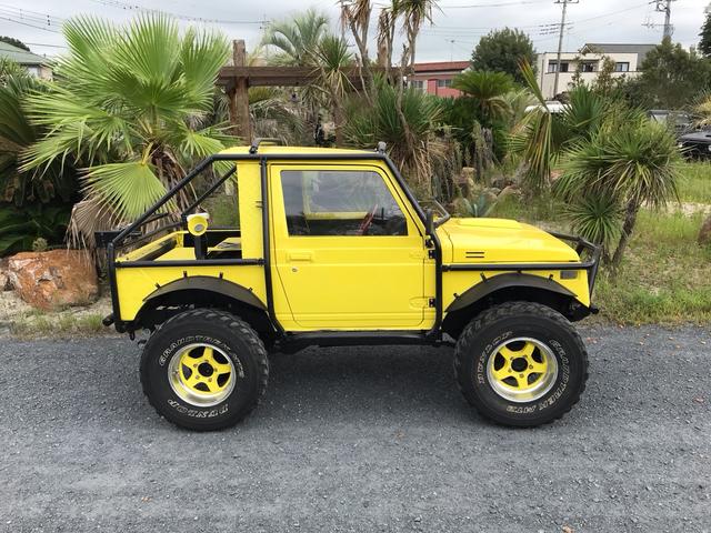 ジムニー サマーウインド　リミテッド　ＡＣ　ＰＳ　５ＭＴ　社外リーフリフトアップ　改造公認車　バンカット車　前後エアロッカー　ダウンギア　油圧電動Ｗパワステ　強化シャフト　ワンオフロールバー　２５５ＭＴタイヤ　ウィンチ　社外前後バンパー（21枚目）