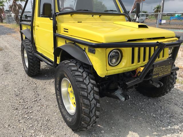 ジムニー サマーウインド　リミテッド　ＡＣ　ＰＳ　５ＭＴ　社外リーフリフトアップ　改造公認車　バンカット車　前後エアロッカー　ダウンギア　油圧電動Ｗパワステ　強化シャフト　ワンオフロールバー　２５５ＭＴタイヤ　ウィンチ　社外前後バンパー（49枚目）