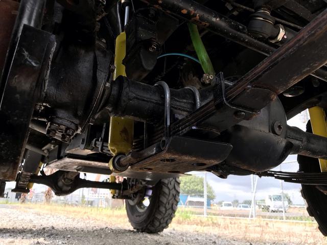 ジムニー サマーウインド　リミテッド　ＡＣ　ＰＳ　５ＭＴ　社外リーフリフトアップ　改造公認車　バンカット車　前後エアロッカー　ダウンギア　油圧電動Ｗパワステ　強化シャフト　ワンオフロールバー　２５５ＭＴタイヤ　ウィンチ　社外前後バンパー（53枚目）