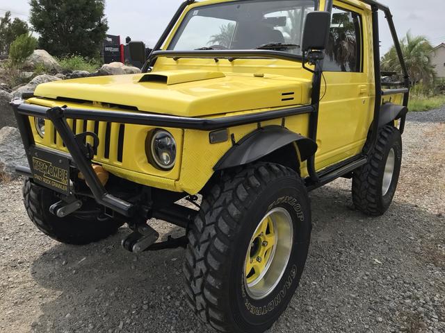 ジムニー サマーウインド　リミテッド　ＡＣ　ＰＳ　５ＭＴ　社外リーフリフトアップ　改造公認車　バンカット車　前後エアロッカー　ダウンギア　油圧電動Ｗパワステ　強化シャフト　ワンオフロールバー　２５５ＭＴタイヤ　ウィンチ　社外前後バンパー（54枚目）