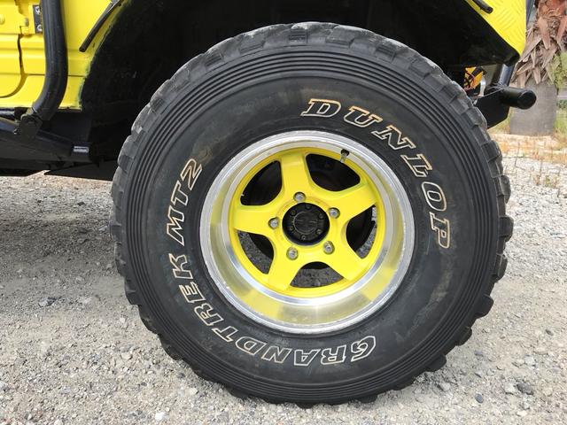 ジムニー サマーウインド　リミテッド　ＡＣ　ＰＳ　５ＭＴ　社外リーフリフトアップ　改造公認車　バンカット車　前後エアロッカー　ダウンギア　油圧電動Ｗパワステ　強化シャフト　ワンオフロールバー　２５５ＭＴタイヤ　ウィンチ　社外前後バンパー（56枚目）