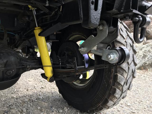 ジムニー サマーウインド　リミテッド　ＡＣ　ＰＳ　５ＭＴ　社外リーフリフトアップ　改造公認車　バンカット車　前後エアロッカー　ダウンギア　油圧電動Ｗパワステ　強化シャフト　ワンオフロールバー　２５５ＭＴタイヤ　ウィンチ　社外前後バンパー（64枚目）