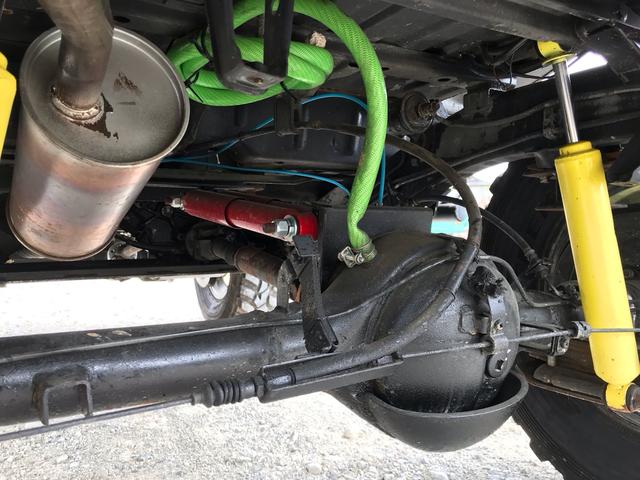 ジムニー サマーウインド　リミテッド　ＡＣ　ＰＳ　５ＭＴ　社外リーフリフトアップ　改造公認車　バンカット車　前後エアロッカー　ダウンギア　油圧電動Ｗパワステ　強化シャフト　ワンオフロールバー　２５５ＭＴタイヤ　ウィンチ　社外前後バンパー（66枚目）