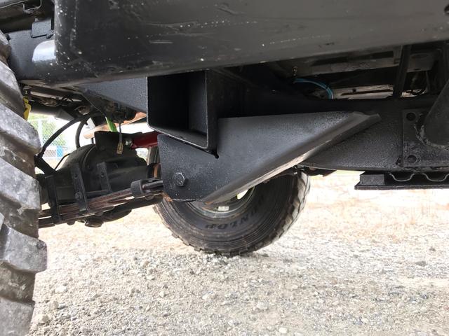 ジムニー サマーウインド　リミテッド　ＡＣ　ＰＳ　５ＭＴ　社外リーフリフトアップ　改造公認車　バンカット車　前後エアロッカー　ダウンギア　油圧電動Ｗパワステ　強化シャフト　ワンオフロールバー　２５５ＭＴタイヤ　ウィンチ　社外前後バンパー（68枚目）