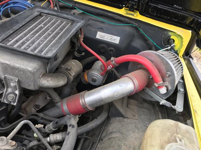 ジムニー サマーウインド　リミテッド　ＡＣ　ＰＳ　５ＭＴ　社外リーフリフトアップ　改造公認車　バンカット車　前後エアロッカー　ダウンギア　油圧電動Ｗパワステ　強化シャフト　ワンオフロールバー　２５５ＭＴタイヤ　ウィンチ　社外前後バンパー（71枚目）