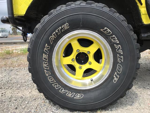 ジムニー サマーウインド　リミテッド　ＡＣ　ＰＳ　５ＭＴ　社外リーフリフトアップ　改造公認車　バンカット車　前後エアロッカー　ダウンギア　油圧電動Ｗパワステ　強化シャフト　ワンオフロールバー　２５５ＭＴタイヤ　ウィンチ　社外前後バンパー（80枚目）