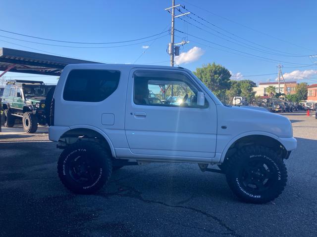 ジムニー XG AC PS PW 5MT 実走行 社外リフトアップキット 社外マフラー 社外LEDテール 社外マフラー 社外AW MTタイヤ 前後社外バンパー フルセグTVナビ バックカメラ ドラレコ 追加メーター(8枚目)