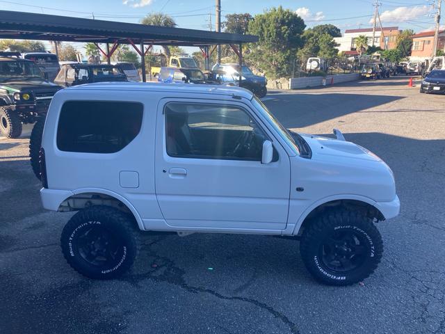 ジムニー XG AC PS PW 5MT 実走行 社外リフトアップキット 社外マフラー 社外LEDテール 社外マフラー 社外AW MTタイヤ 前後社外バンパー フルセグTVナビ バックカメラ ドラレコ 追加メーター(10枚目)