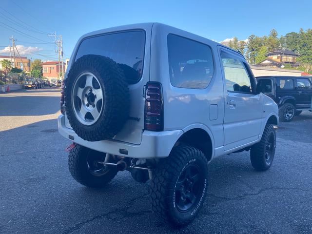 ジムニー XG AC PS PW 5MT 実走行 社外リフトアップキット 社外マフラー 社外LEDテール 社外マフラー 社外AW MTタイヤ 前後社外バンパー フルセグTVナビ バックカメラ ドラレコ 追加メーター(11枚目)