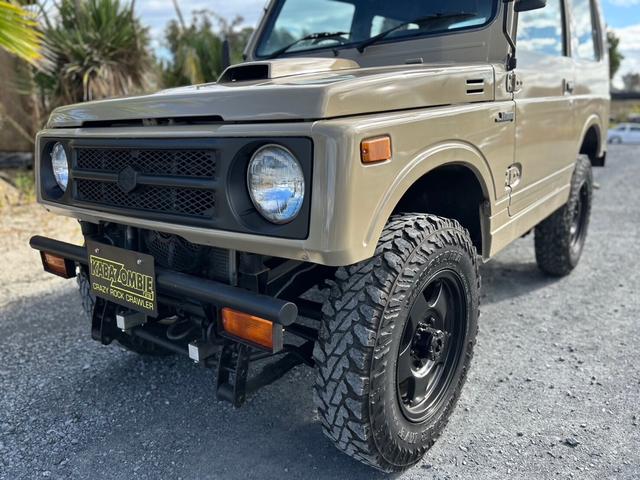 ジムニー ランドベンチャー　ＡＣ　ＰＳ　５ＭＴ　最終型　全塗装　リフトアップ　社外シャックル　ボディーリフト　フロント社外バンパー　ＬＥＤナンバー灯　社外ＡＷ　ＭＴタイヤ　社外牽引フック　ルーフキャリア　シートカバー　天張り替え（56枚目）