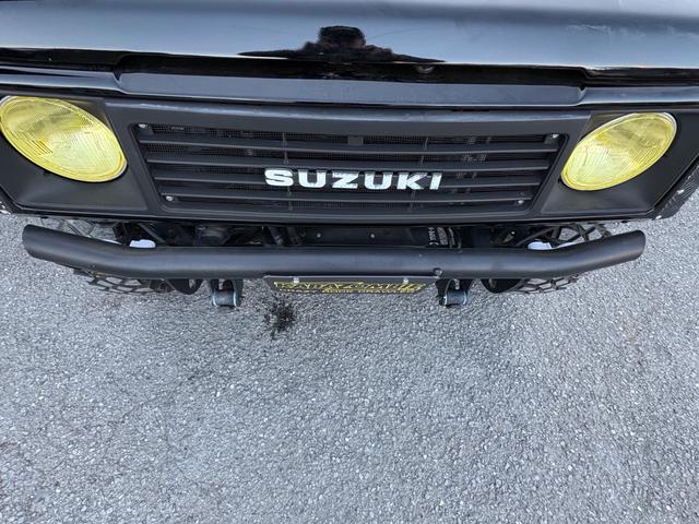 ジムニー ワイルドウインドリミテッド　ＡＣ　ＰＳ　５ＭＴ　リフトアップ　全塗装　改造公認車　リビルトＥＧ載せ替え済み　エアコンＯＨ済み　１型グリル　外ＡＷ　ＭＴタイヤ　外前後バンパー外タンクガードマフラースピーカーシートカバーウッド内張り（68枚目）