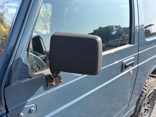 ジムニー ランドベンチャー　ＡＣ　ＰＳ　５ＭＴ　ＪＡ１１最終型　リフトアップ改造公認車　全塗装　社外ウッドステアリング　ウッド天張り＆内張り　前後社外バンパー　１型グリル　ＪＢ２３ＡＷ　ＭＴタイヤ　社外テール　社外サイドミラー（68枚目）