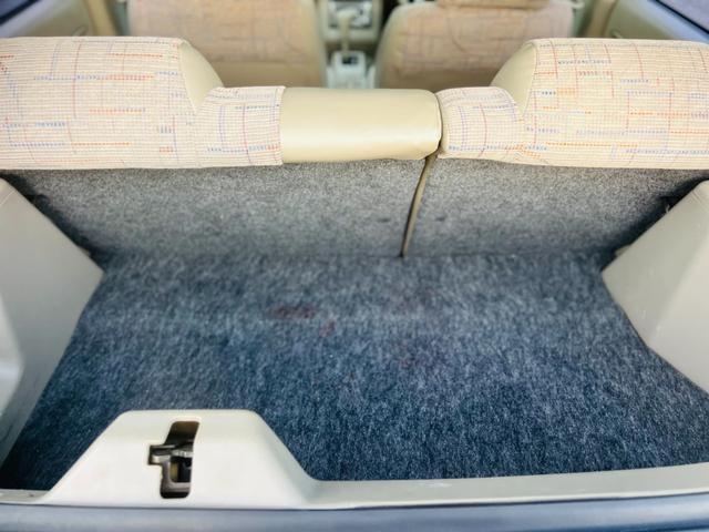 ラシーン タイプＩＩ　ＥＴＣ車載器　サンルーフ　／４ＷＤ　ＡＢＳ　寒冷地仕様　パワーウィンドウ　エアバッグ　パワステ　カセット　デュアルエアバッグ　マニュアルエアコン（28枚目）