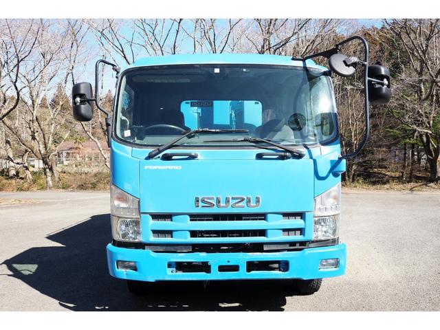 フォワード 　塵芥車　新明和製　プレス式　パッカー車　１０．２立米　ペーパー仕様　積載１．７ｔ　ターボ２１０馬力　２人乗り　連続スイッチ付　汚水タンク付　矢崎製　計量器付　坂道発進補助装置　バックモニター　ＥＴＣ（8枚目）