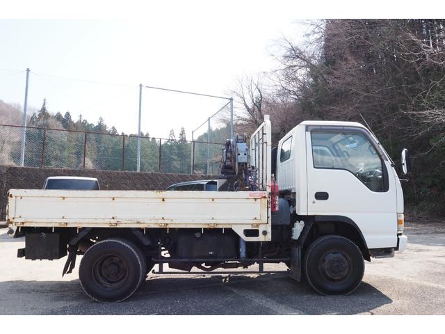 エルフトラック 　パートタイム４ＷＤ　四駆　高床　標準ショート　１０尺　タダノ製　ＺＲ２２４　簡易４段クレーン　フックイン　２．２２ｔ吊　ラジコン付　平ボディ　三方開　板張り　内フック　積載２ｔ　坂道発進補助装置（33枚目）