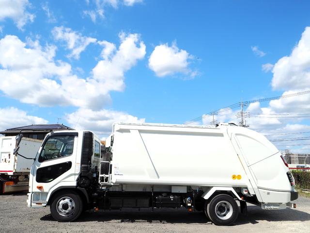 ファイター 　未使用　新明和　ＧＴ１０４－５７３４Ｐ　塵芥車／パッカー車　プレス式　ダンボール／ペーパー仕様　容積１０．２立米　連続スイッチ　汚水タンク　ターボ２２０馬力　積載１．２５ｔ　６速ＭＴ　バックモニター（2枚目）