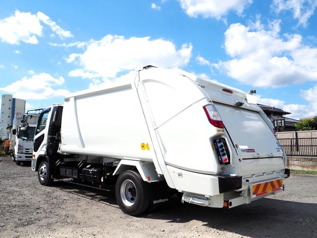ファイター 　未使用　新明和　ＧＴ１０４－５７３４Ｐ　塵芥車／パッカー車　プレス式　ダンボール／ペーパー仕様　容積１０．２立米　連続スイッチ　汚水タンク　ターボ２２０馬力　積載１．２５ｔ　６速ＭＴ　バックモニター（3枚目）