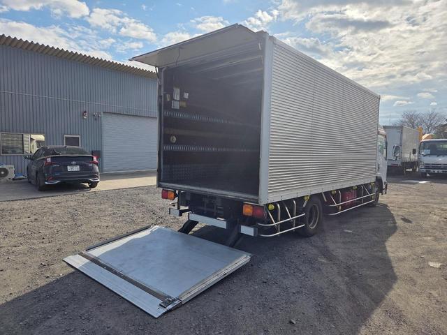 エルフトラック ディーラーにてエンジン載替済み ワイド超ロング アルミバン 日本フルハーフ コンビゲート(上蓋+跳ね上げパワーゲート) 昇降能力1000kg 庫内有線リモコン付 ラッシング2段 スムーサー(2ペダル)(12枚目)