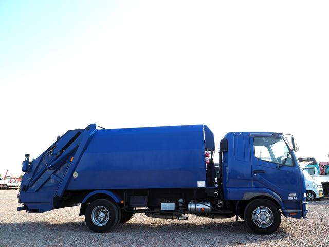 ファイター 　富士車輌製　パッカー車／塵芥車　ＰＬ４１０９　プレス式　容積１０立米　連続スイッチ　汚水タンク付　上物同年　リーフサス　ターボ２４０馬力　積載１．７ｔ　６速ＭＴ　ベッド付き　坂道発進補助装置（6枚目）