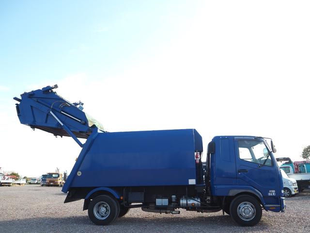 ファイター 　富士車輌製　パッカー車／塵芥車　ＰＬ４１０９　プレス式　容積１０立米　連続スイッチ　汚水タンク付　上物同年　リーフサス　ターボ２４０馬力　積載１．７ｔ　６速ＭＴ　ベッド付き　坂道発進補助装置（9枚目）