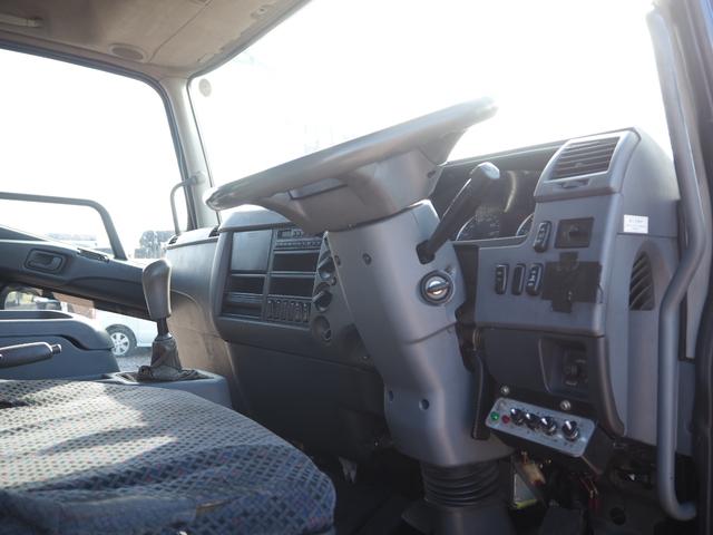 ファイター 　富士車輌製　パッカー車／塵芥車　ＰＬ４１０９　プレス式　容積１０立米　連続スイッチ　汚水タンク付　上物同年　リーフサス　ターボ２４０馬力　積載１．７ｔ　６速ＭＴ　ベッド付き　坂道発進補助装置（60枚目）