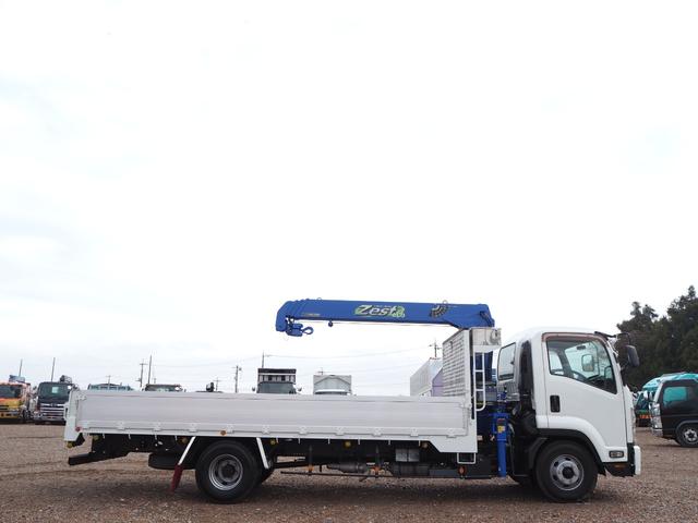 フォワード 　標準幅　タダノ製　ＴＭ－ＺＥ３０４ＨＲ　４段クレーン　フックイン　２．９３ｔ吊　ラジコン付　上物同年　アルミブロック平ボディ　三方開　内フック　リーフサス　ターボ１９０馬力　積載２．６５ｔ　６速ＭＴ（29枚目）