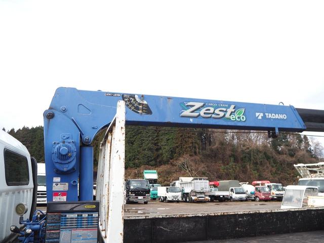 キャンター 　ワイドロング　タダノ製　ＴＭ－ＺＥ２９４ＭＨ　４段クレーン　フックイン　差し違いアウトリガー　２．９３ｔ吊　ラジコン　上物同年　平ボディ　軽々ゲート　ターボ１５０馬力　積載２ｔ　５速ＭＴ　ＥＴＣ（17枚目）