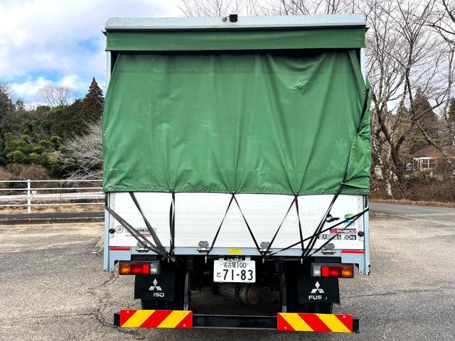 キャンター 　ワイドセミロング　幌車／カーテン車　アルミブロック平ボディ　床面：鉄板張り　ターボ１７５馬力　積載４．６５ｔ　５速ＭＴ　坂道発進補助装置　バックモニター　ドライブレコーダー　ＥＴＣ（4枚目）