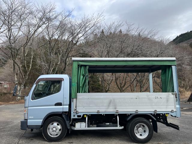 キャンター 　ワイドセミロング　幌車／カーテン車　アルミブロック平ボディ　床面：鉄板張り　ターボ１７５馬力　積載４．６５ｔ　５速ＭＴ　坂道発進補助装置　バックモニター　ドライブレコーダー　ＥＴＣ（10枚目）