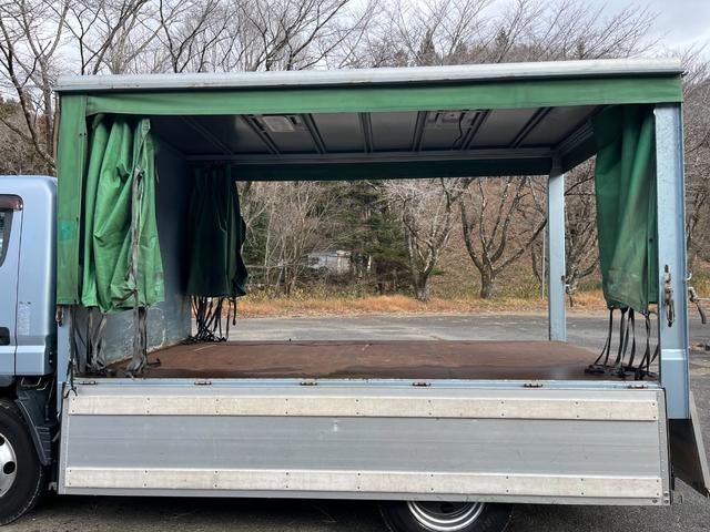 キャンター 　ワイドセミロング　幌車／カーテン車　アルミブロック平ボディ　床面：鉄板張り　ターボ１７５馬力　積載４．６５ｔ　５速ＭＴ　坂道発進補助装置　バックモニター　ドライブレコーダー　ＥＴＣ（16枚目）