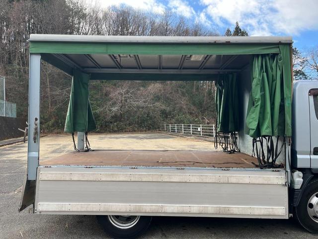 キャンター 　ワイドセミロング　幌車／カーテン車　アルミブロック平ボディ　床面：鉄板張り　ターボ１７５馬力　積載４．６５ｔ　５速ＭＴ　坂道発進補助装置　バックモニター　ドライブレコーダー　ＥＴＣ（19枚目）