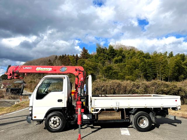 エルフトラック 　ワイドロング　古河ユニック製　ＵＲＵ２９５　５段クレーン　フックイン　差し違いアウトリガー　２．９３ｔ吊　ラジコン付　上物同年　平ボディ　床鉄板張り　ターボ１６０馬力　積載３ｔ　６速ＭＴ　煤焼きなし（2枚目）