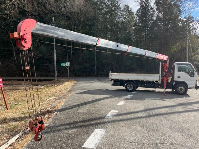 エルフトラック 　ワイドロング　古河ユニック製　ＵＲＵ２９５　５段クレーン　フックイン　差し違いアウトリガー　２．９３ｔ吊　ラジコン付　上物同年　平ボディ　床鉄板張り　ターボ１６０馬力　積載３ｔ　６速ＭＴ　煤焼きなし（20枚目）