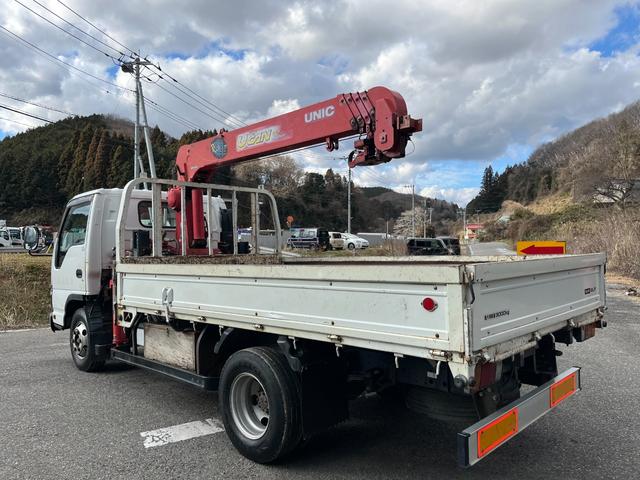 エルフトラック 　ワイドロング　古河ユニック製　ＵＲＵ２９５　５段クレーン　フックイン　差し違いアウトリガー　２．９３ｔ吊　ラジコン付　上物同年　平ボディ　床鉄板張り　ターボ１６０馬力　積載３ｔ　６速ＭＴ　煤焼きなし（27枚目）