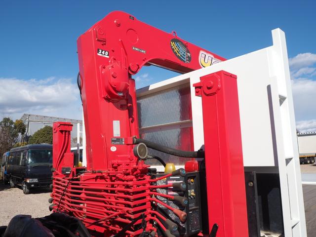 ファイター 　セミワイド幅　増トン　重機回送車　古河ユニック製　４段クレーン　フックイン　ハイジャッキ　角足　２．９３ｔ吊　ラジコン付　積載７．２ｔ　床面アピトン　アルミブロックアオリ　ブル掛け　アルミホイール（65枚目）