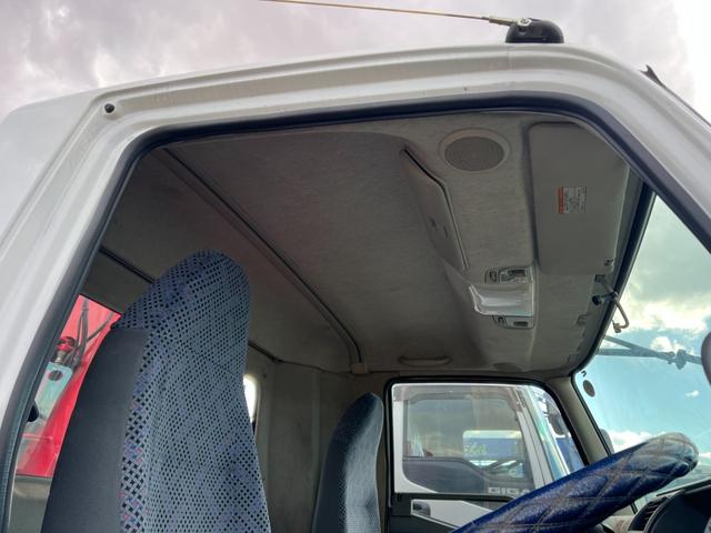 ファイター 　セミワイド幅　増トン　重機回送車　古河ユニック製　４段クレーン　フックイン　ハイジャッキ　角足　２．９３ｔ吊　ラジコン付　積載７．２ｔ　床面アピトン　アルミブロックアオリ　ブル掛け　アルミホイール（76枚目）