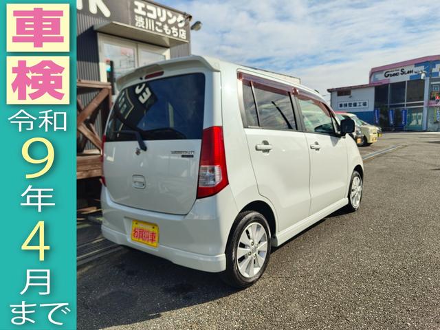 ワゴンＲ ＦＸリミテッドＩＩ　検９年４月　歴無　スマートキー・プッシュスタート・電格ミラー・オートエアコン・フルフラットシート・ヘッドライトレベライザー・車載工具・パンク修理キット・空気入れ・ポータブルカーナビ・１５５／６５／１４（5枚目）